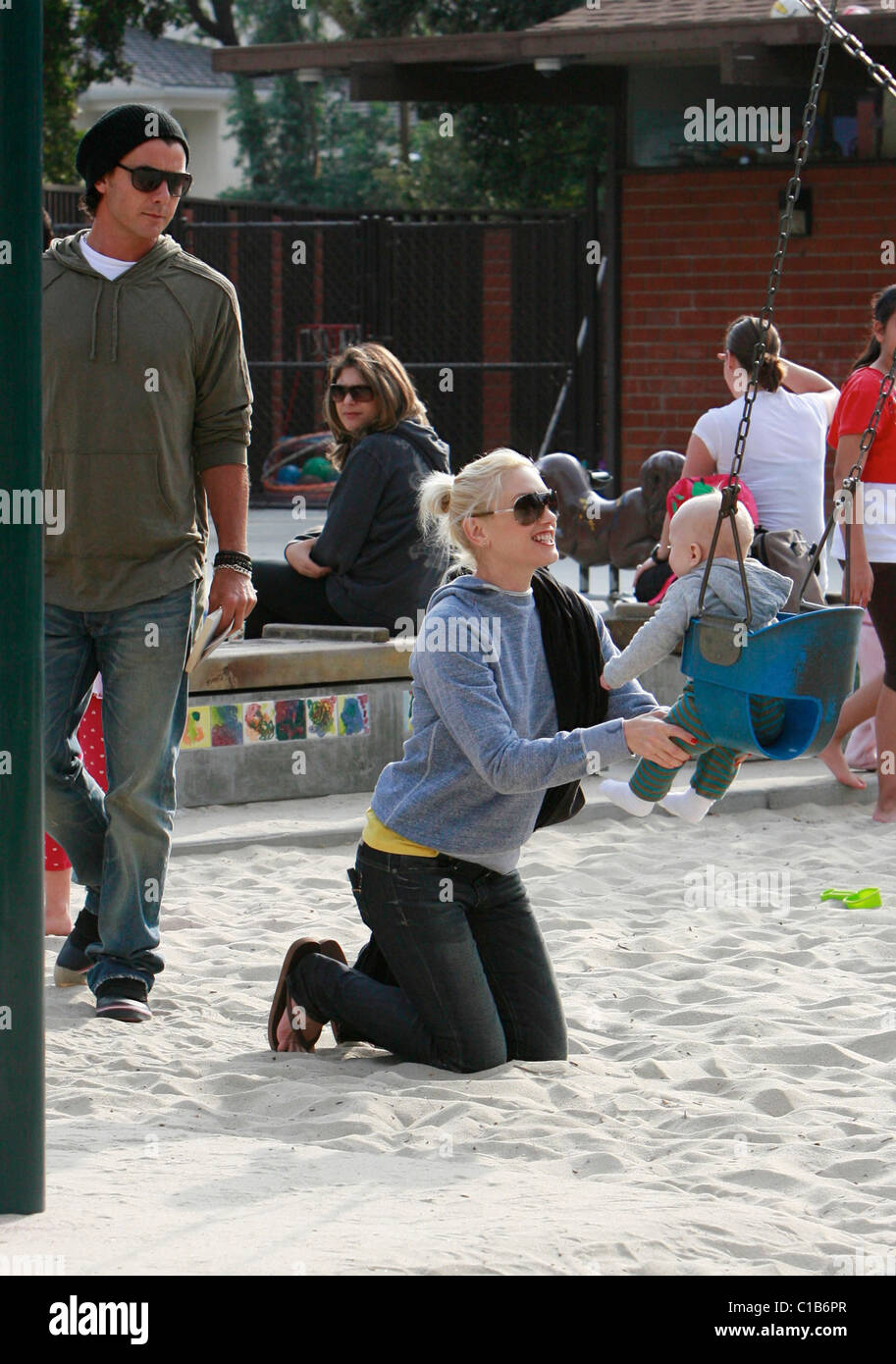 Gwen Stefani pushes baby Zuma in a swing with husband Gavin Rossdale as