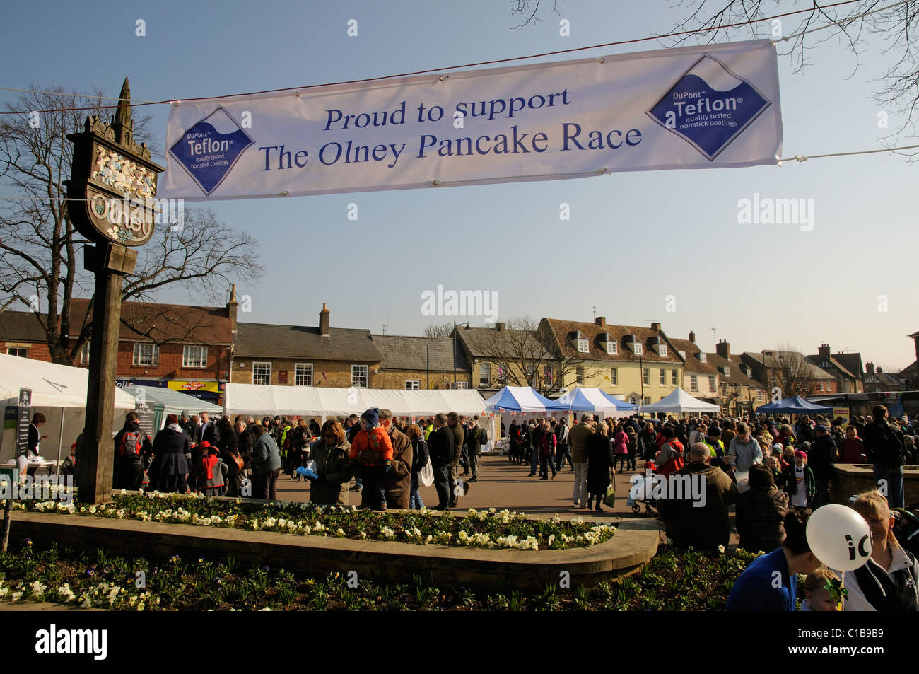 The Olney town sign and banner promoting the annual Pancake Race which