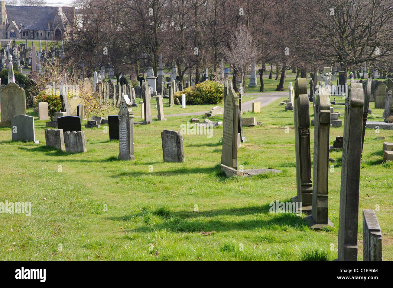 Grave stones in a cemetery. Stock Photo