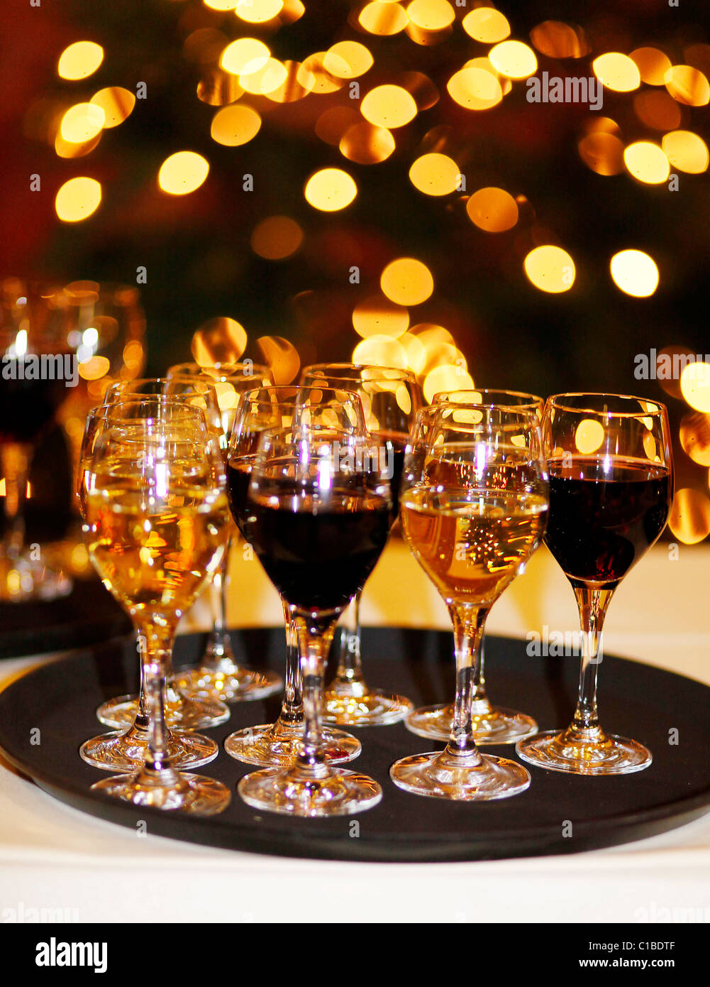 A tray with red and white wine. Stock Photo