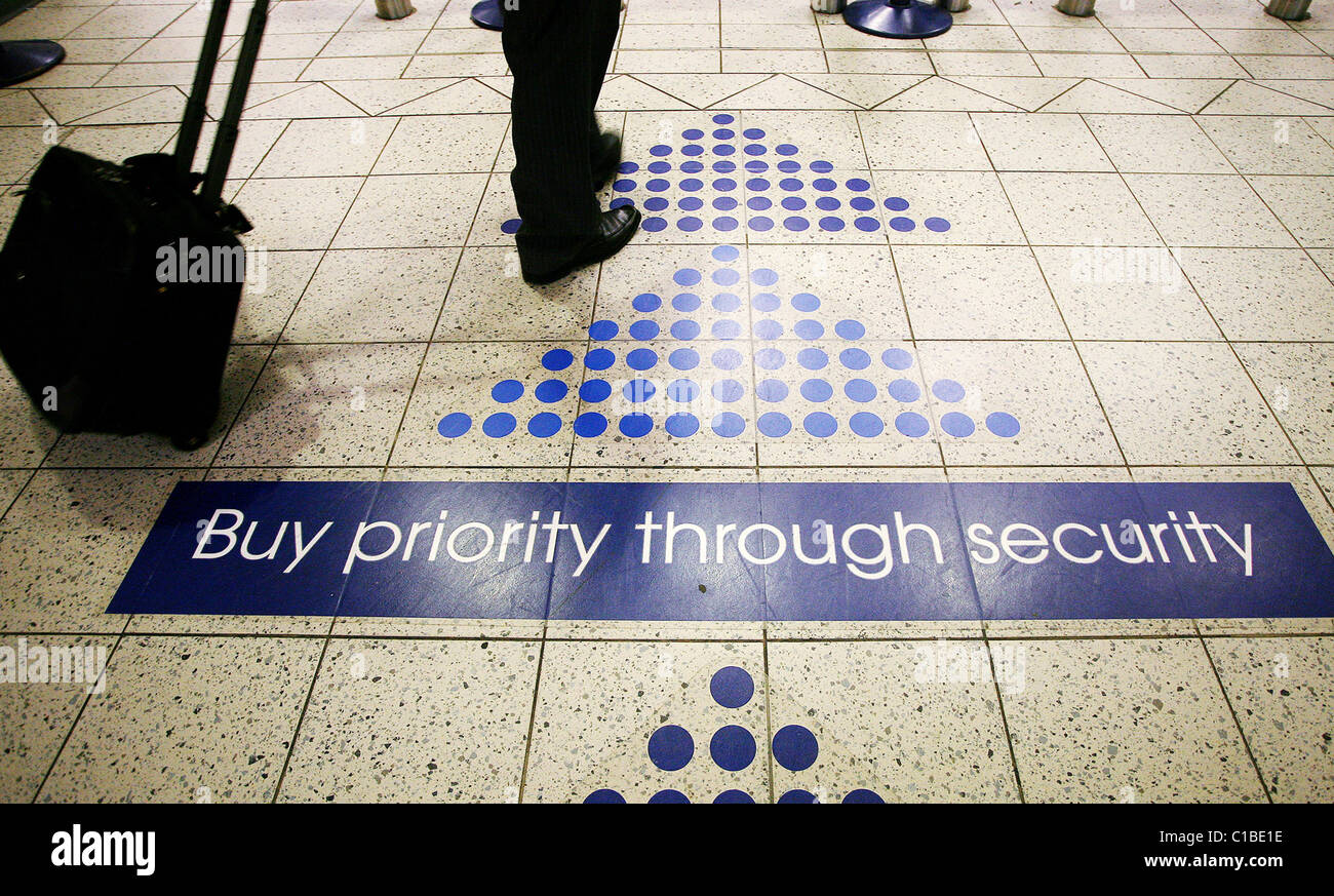 Luton London Airport's 'priority lane' for security. Passengers who buy a ticket can jump the security wait. Stock Photo