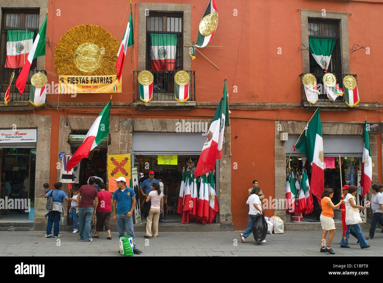 The green, white and red Mexican national flag is on display and for sale throughout the country  before Sept 15th celebration. Stock Photo