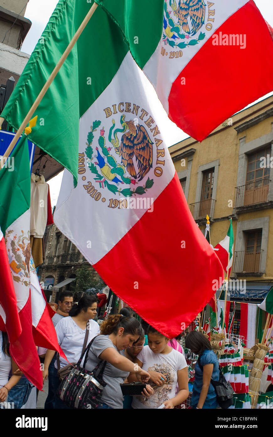 The green, white and red Mexican national flag is on display and for sale throughout the country  before Sept 15th celebration. Stock Photo