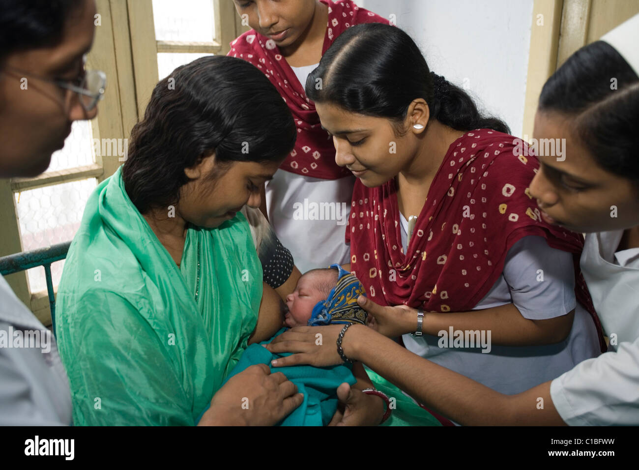 Nurses helping breastfeed hires stock photography and images Alamy