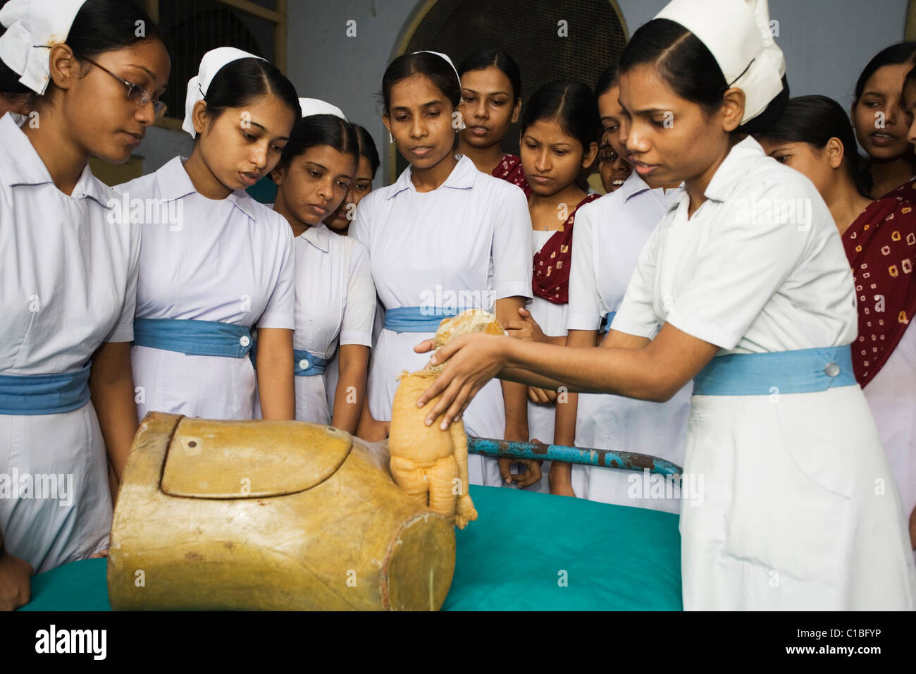 Trainee midwives at Kolkata Nursing College demonstrating childbirth, Kolkata, India Stock Photo