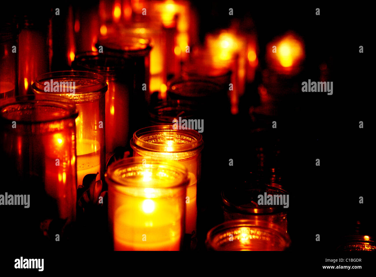 CANDLE CANDLES MANY BURNING CHRISTIAN CATHOLIC DARK LIT CEREMONIAL