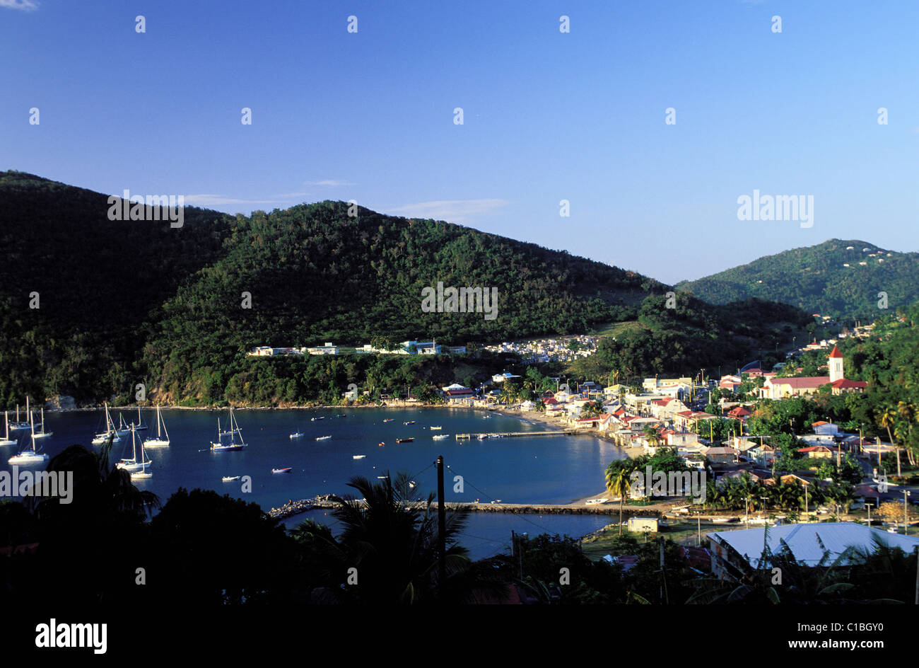 France, Guadeloupe (French West Indies), Basse Terre, Deshaies village nested in a bay Stock