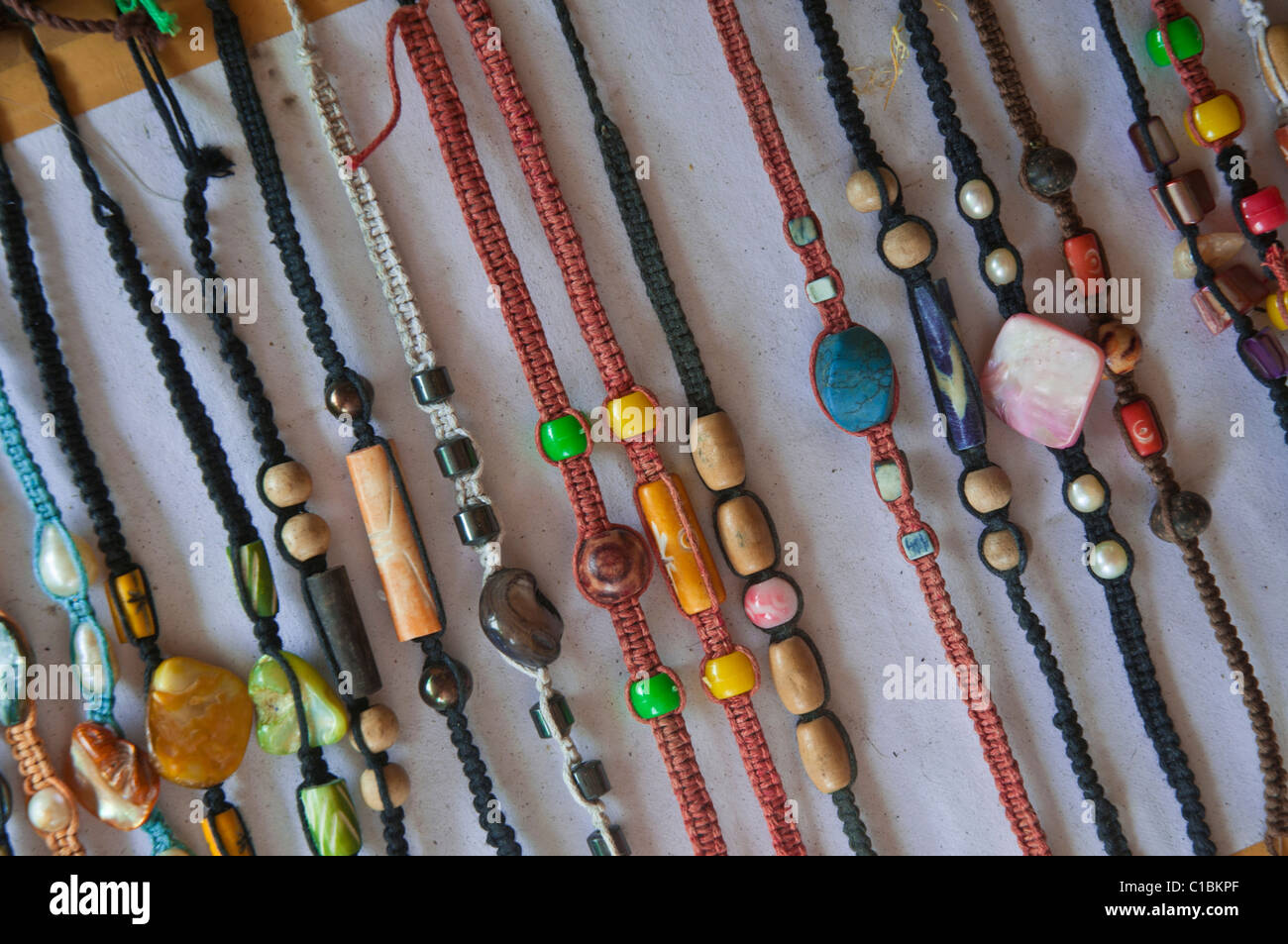 Cheap souvenir bracelets on sale at a resort in Indonesia Stock Photo