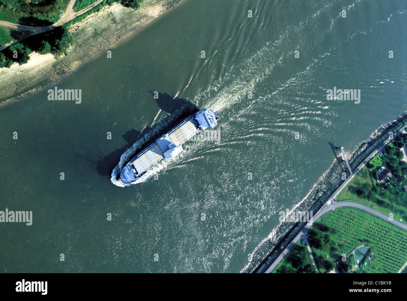 France, Seine Maritime, a cargo going downward the Seine river around the village of Brotonne area (aerial view) Stock Photo