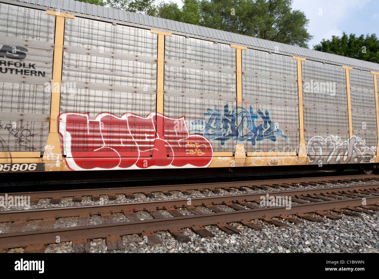 Railroad car carrier with graffiti. Stock Photo