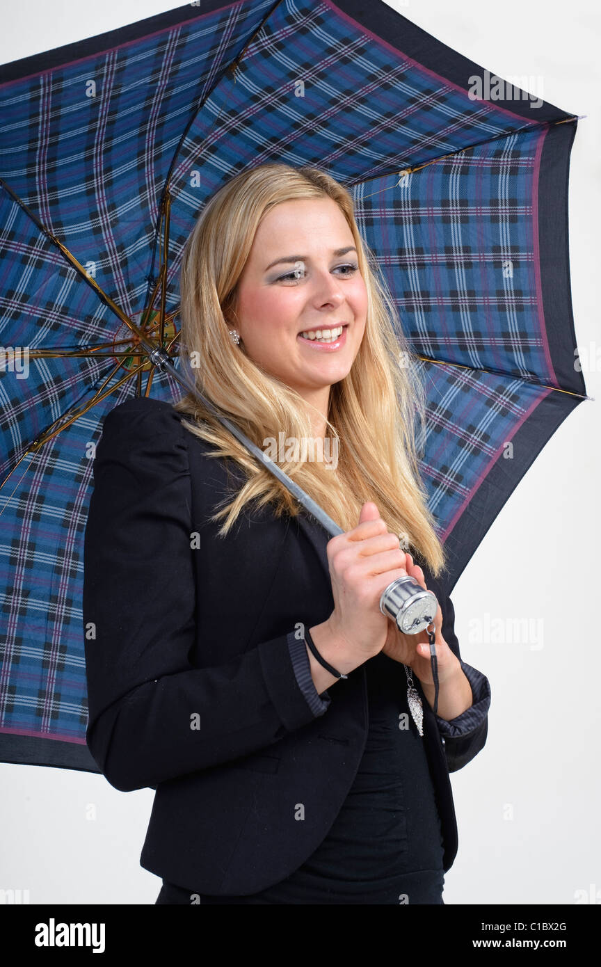 Young woman with umbrella isolated on white background Stock Photo - Alamy