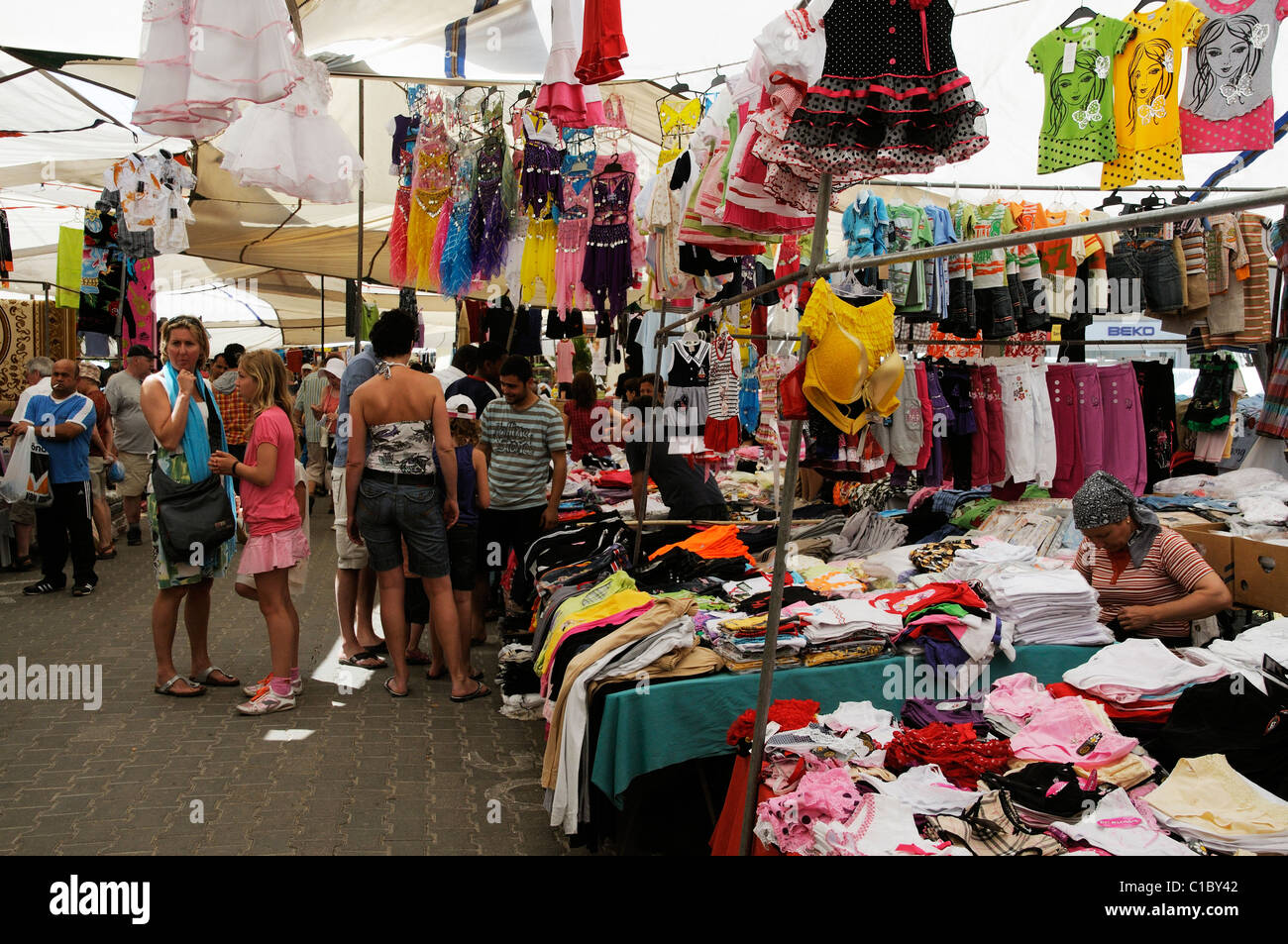 Shopping for clothing in weekly market in the town centre of Turgutreis