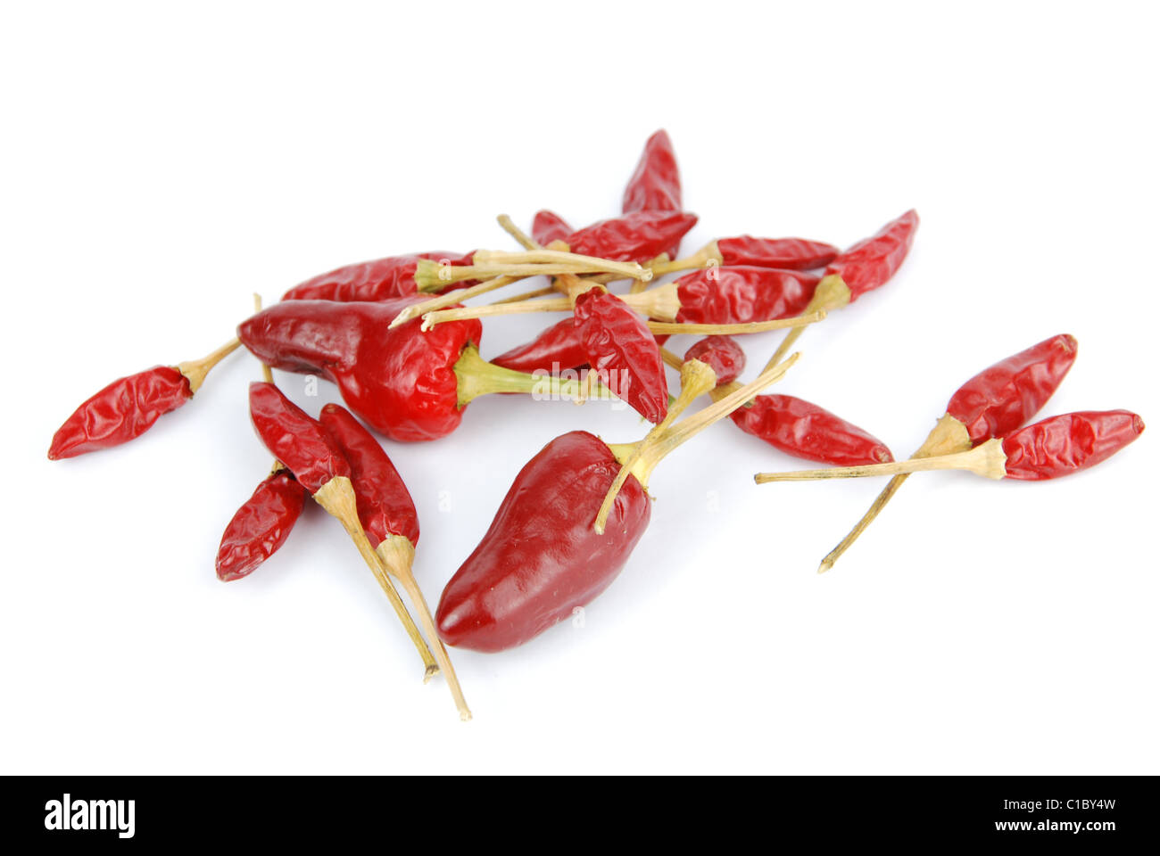 red chili peppers isolated on white Stock Photo - Alamy