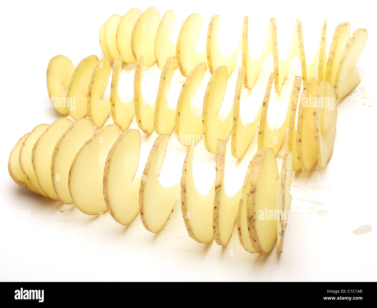Raw potatoes cut in a spiral Stock Photo Alamy