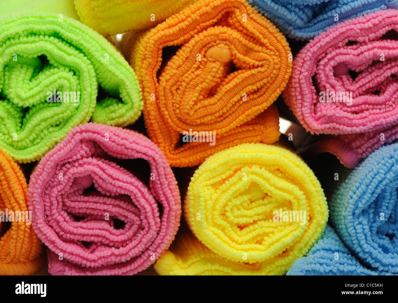 Double color towels curtailed into a roll. A photo close up Stock Photo
