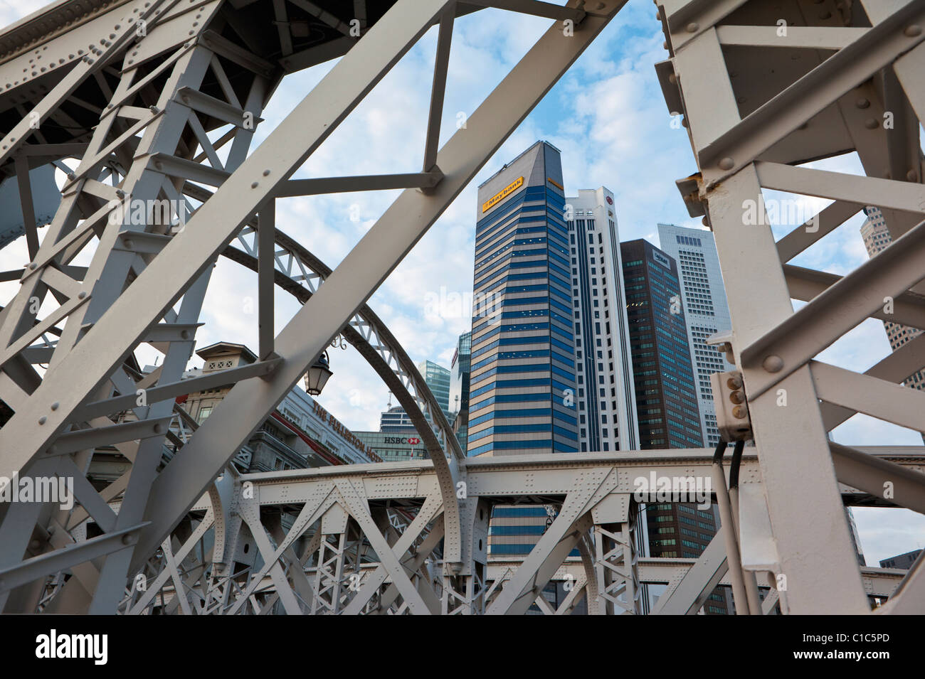 The skyline of the central business district viewed through the Anderson Bridge, Singapore Stock Photo