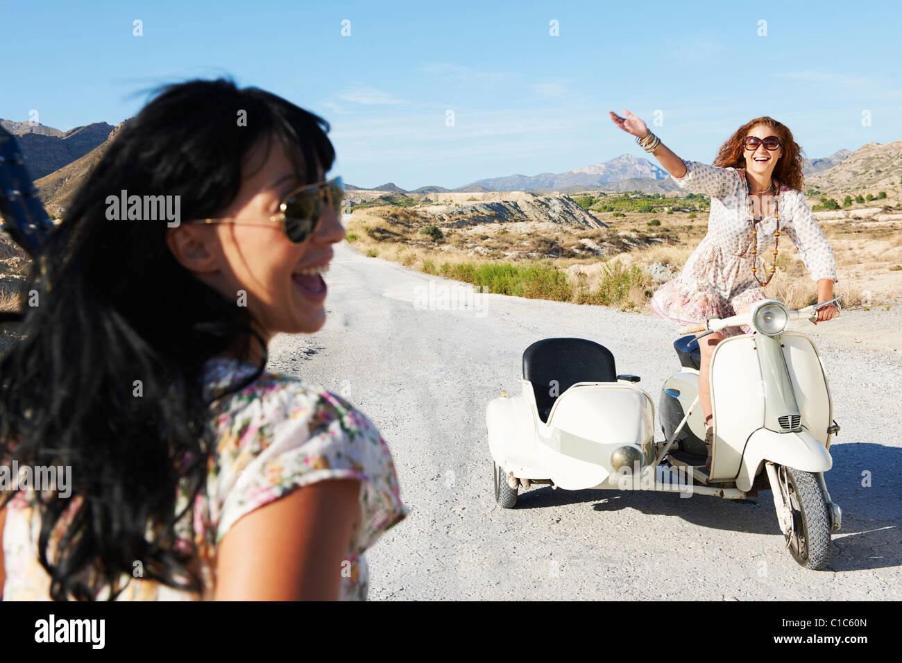 Women with motorbike and sidecar Stock Photo
