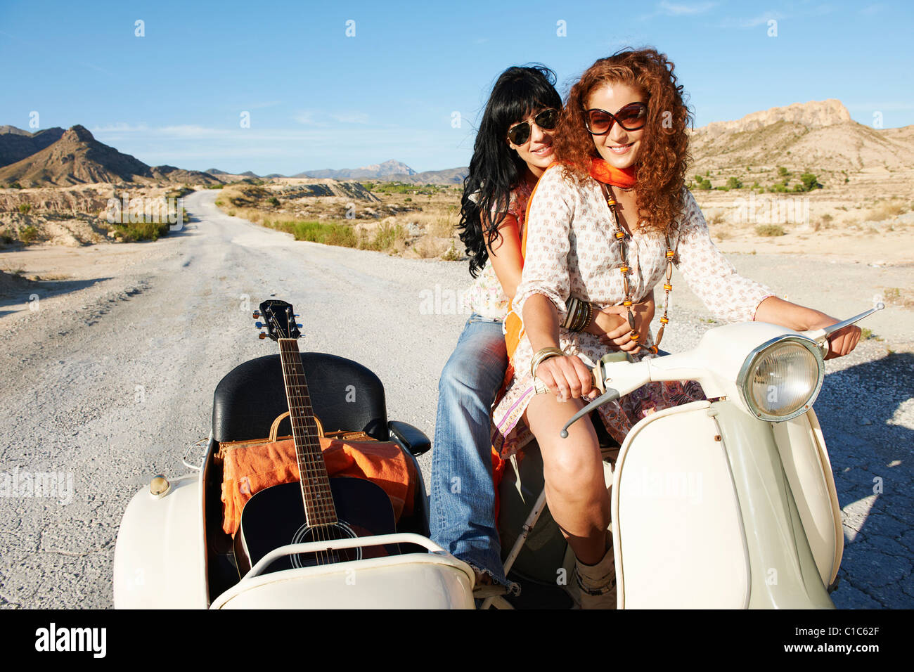 Women with motorbike and sidecar Stock Photo