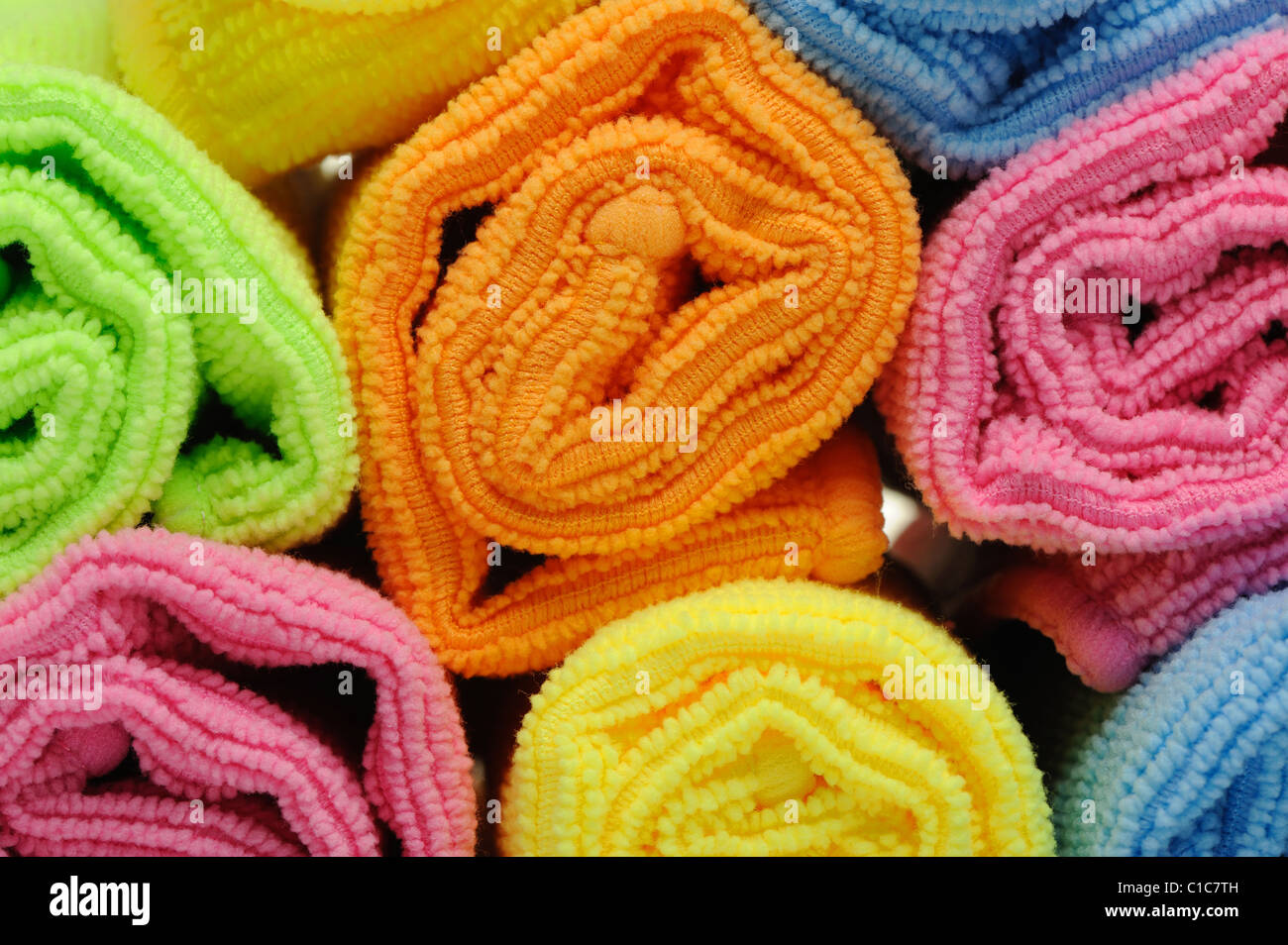 Double color towels curtailed into a roll. A photo close up Stock Photo