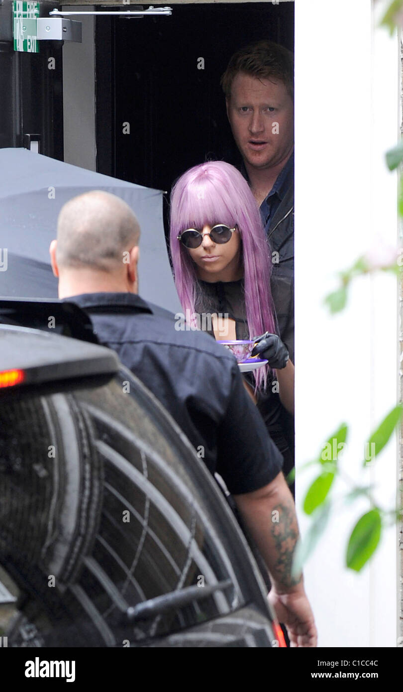 Lady Gaga Leaves Her Hotel Carrying A Teacup And Saucer Which