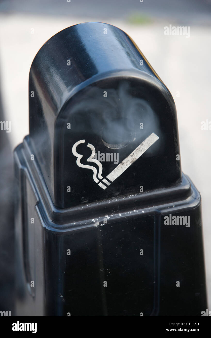 smoking cigarette receptacle at entrance to store Stock Photo Alamy