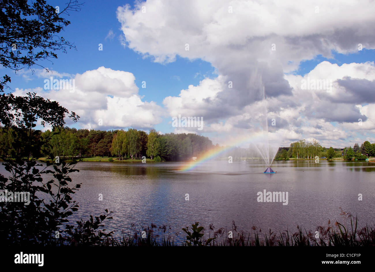 Rainbow over the lake's fountain don’t need rain Stock Photo - Alamy