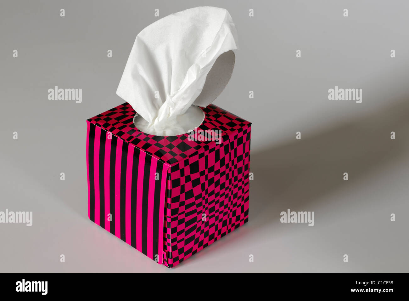 Red and black cardboard paper tissue dispenser box Stock Photo