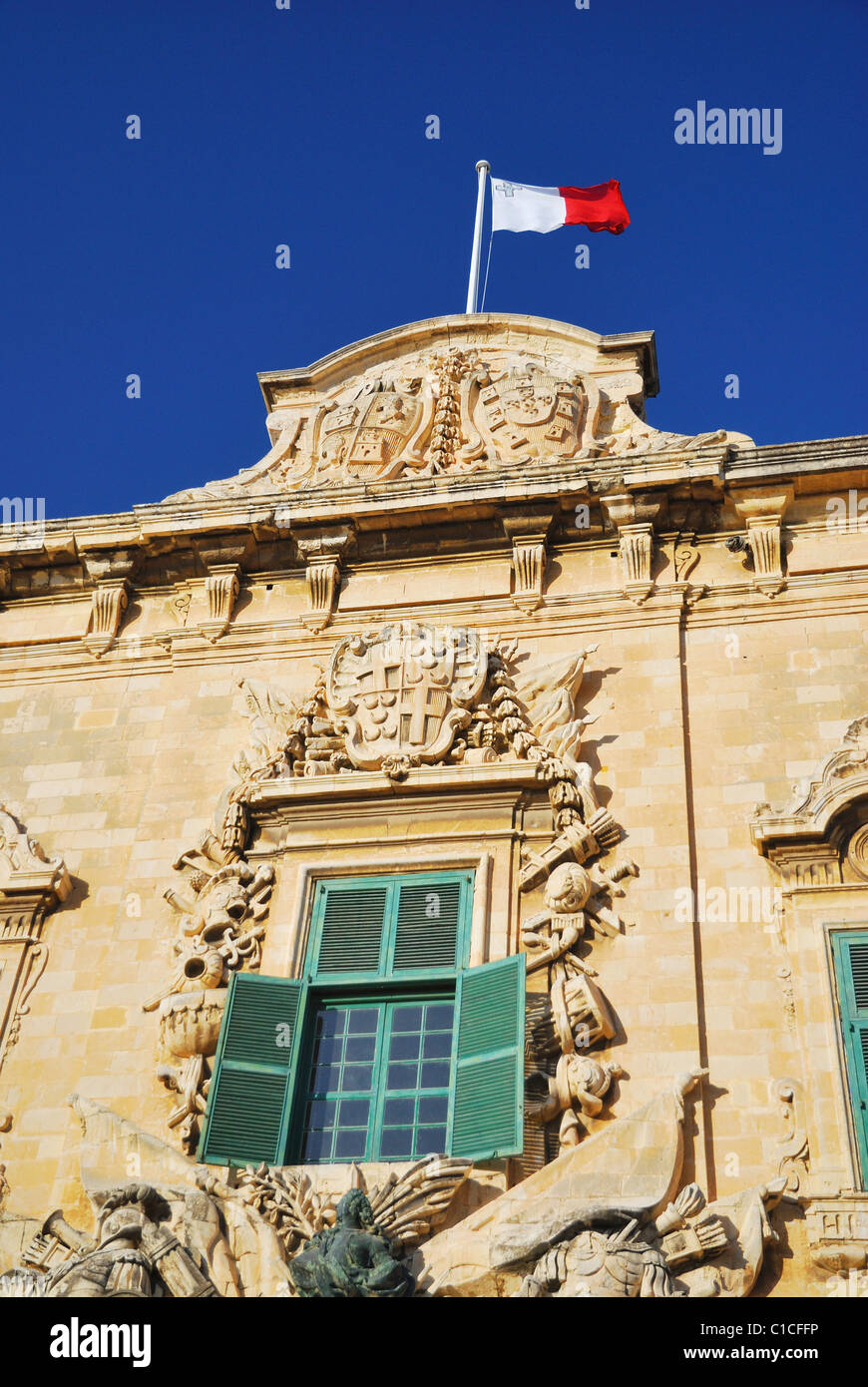 Maltese Flag Over Auberge de Castille Stock Photo