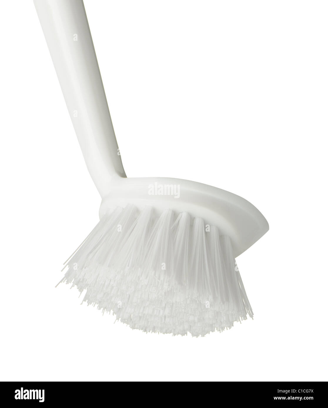 Brush for washing utensils. It is isolated on a white background Stock