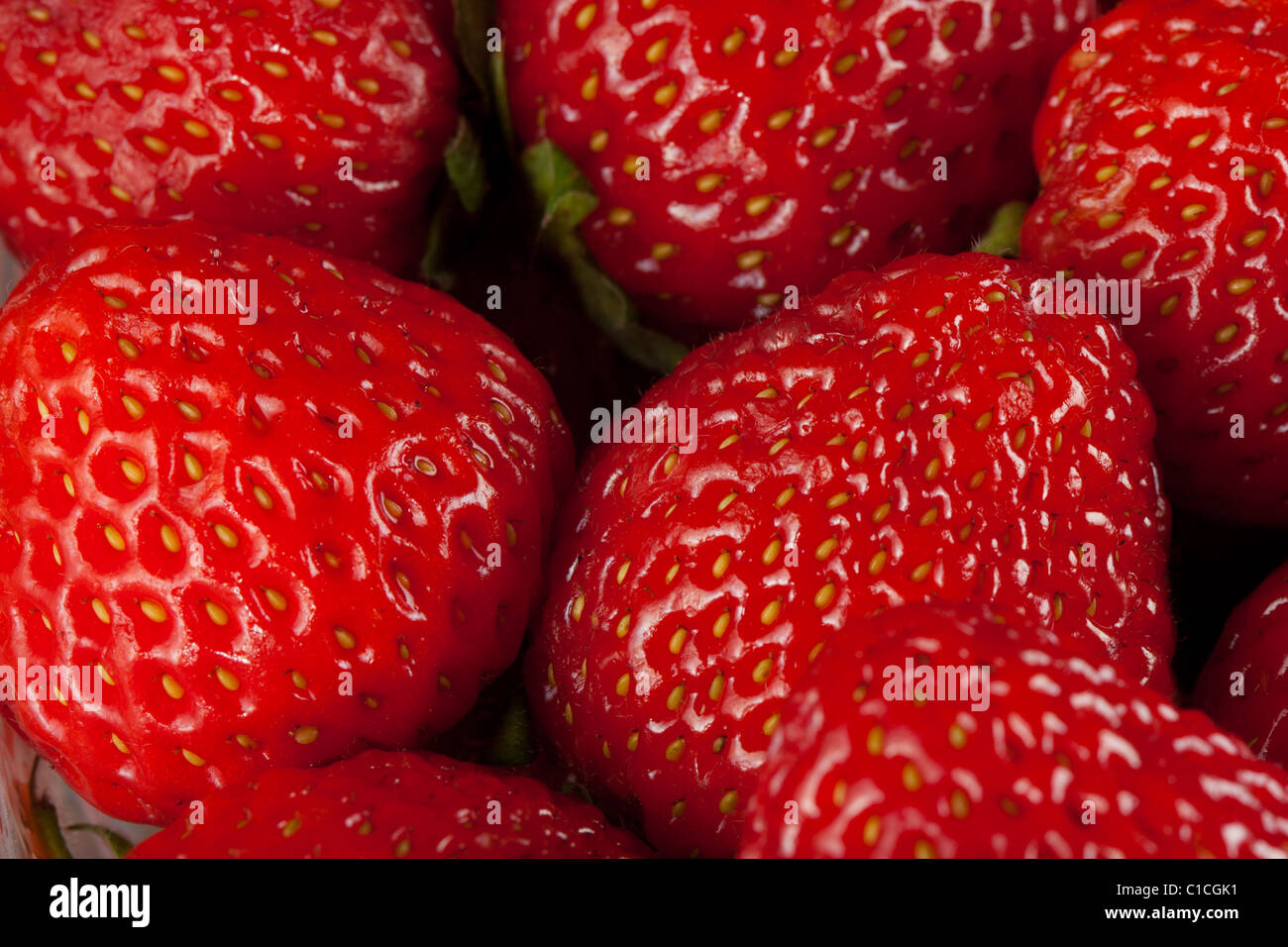 Ripe strawberry on white background close up Stock Photo - Alamy