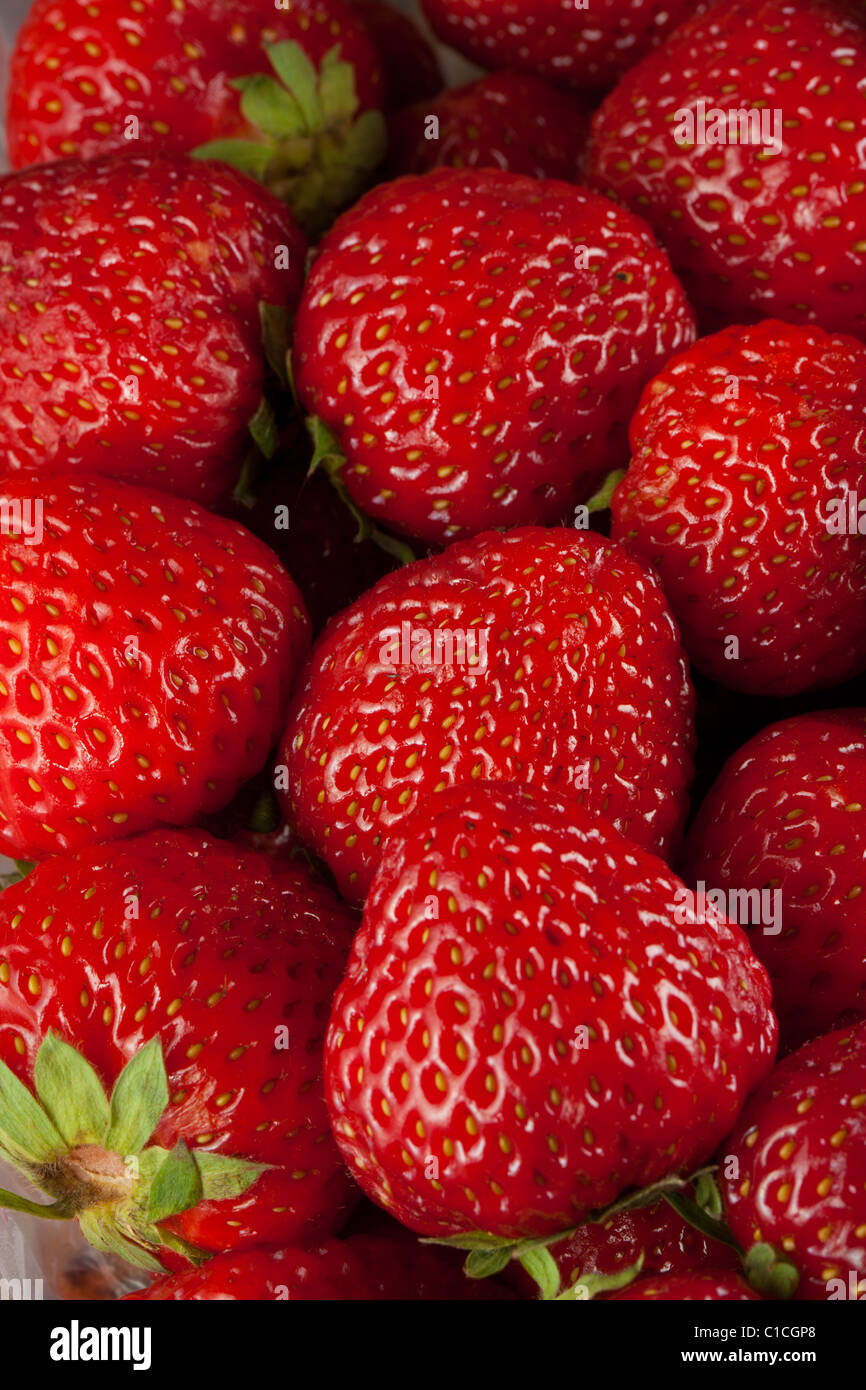 Ripe strawberry on white background close up Stock Photo - Alamy
