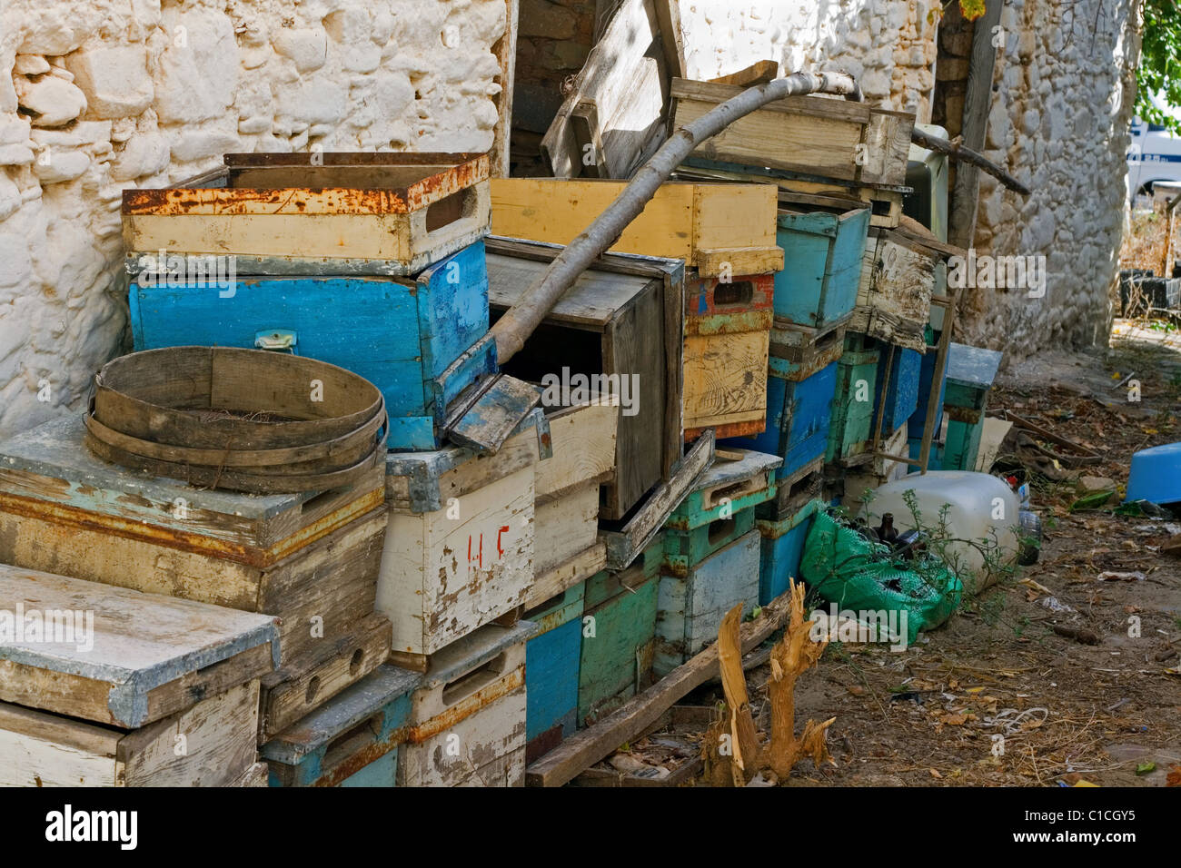 Old disused beehives being stored in a field in Turkey Stock Photo