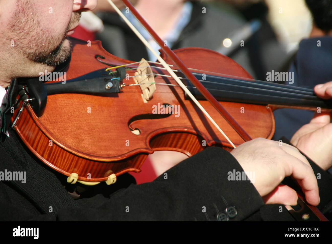 Sun Musical Instruments detail of person with musical instrument outdoors in sun Stock Photo ...