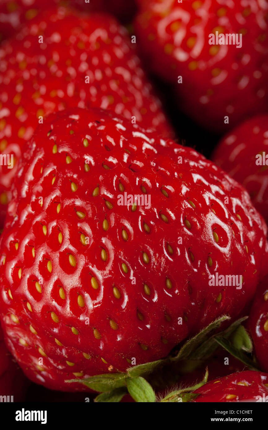 Ripe strawberry on white background Stock Photo - Alamy