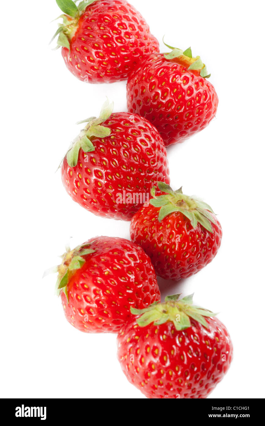 Ripe strawberry on white background Stock Photo - Alamy