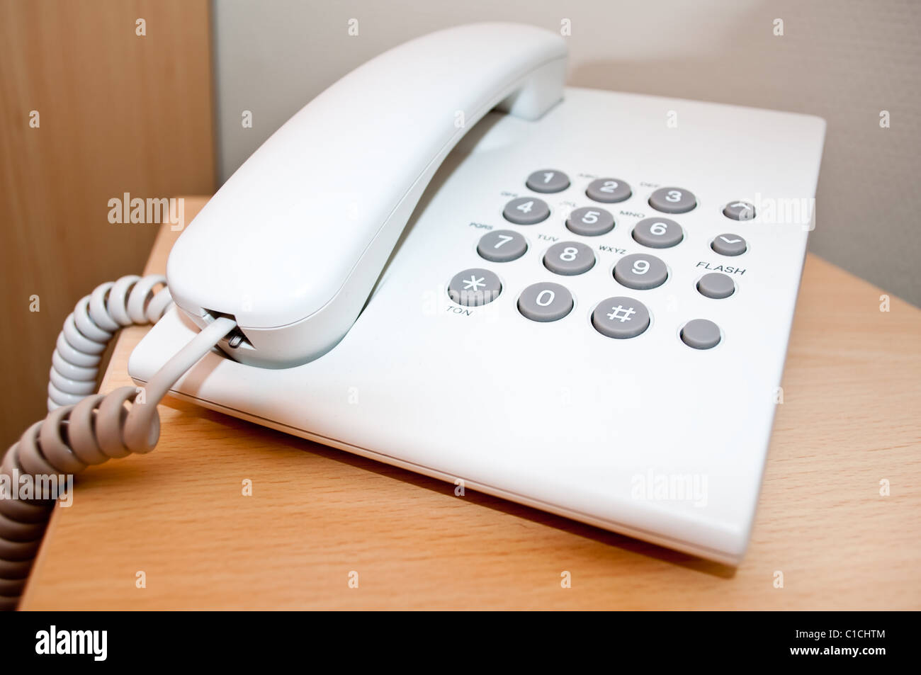 white telephone on desk Stock Photo