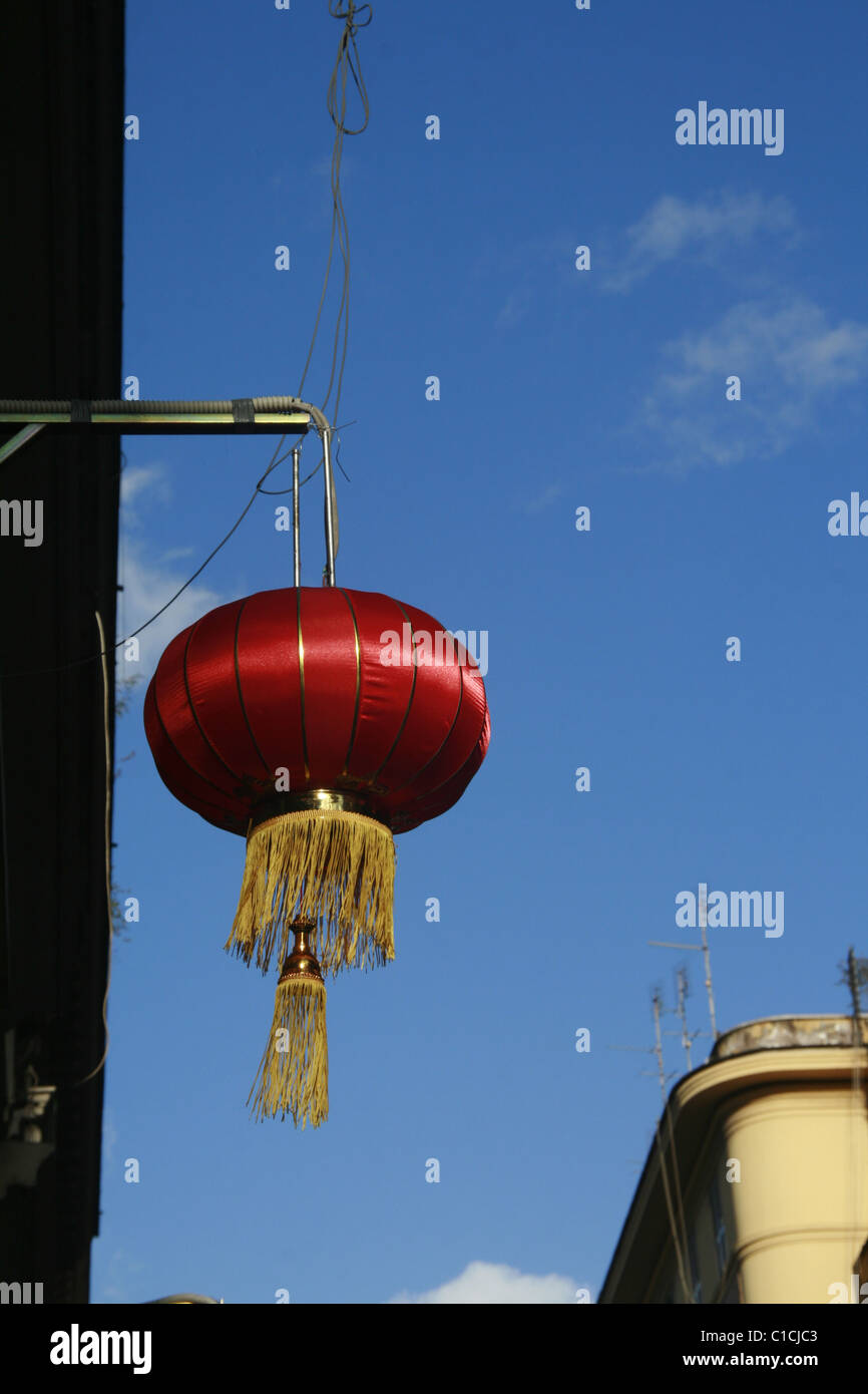 red chinese lantern hanging in blue sky Stock Photo - Alamy