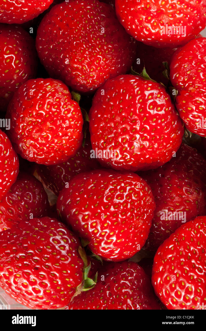 Ripe strawberry on white background close up Stock Photo - Alamy