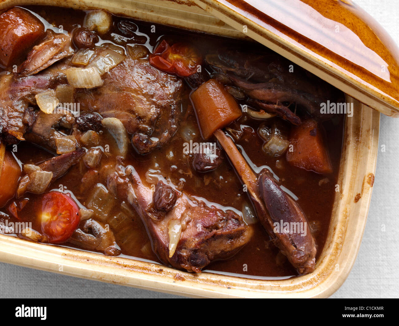 A rustic pot of rabbit stew traditional comfort main meals Stock Photo