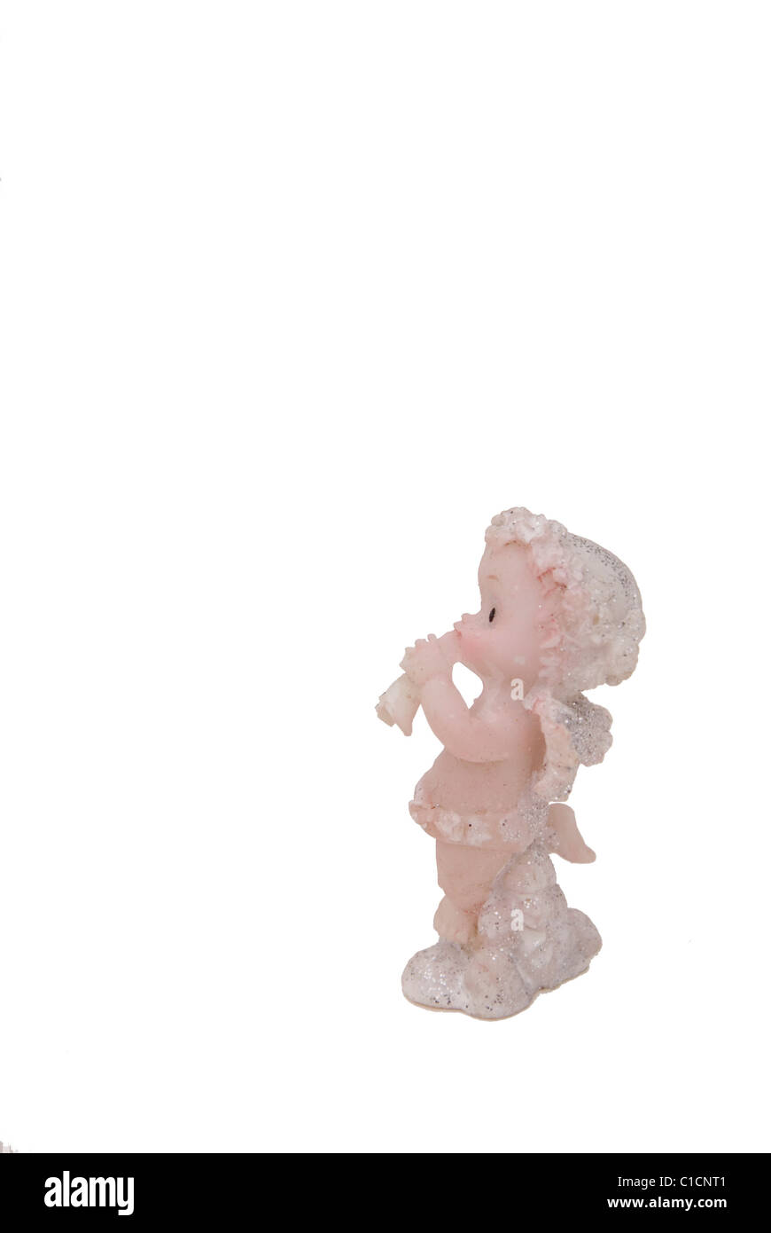 Figure of little angel with a trumpet isolated on a white background Stock Photo