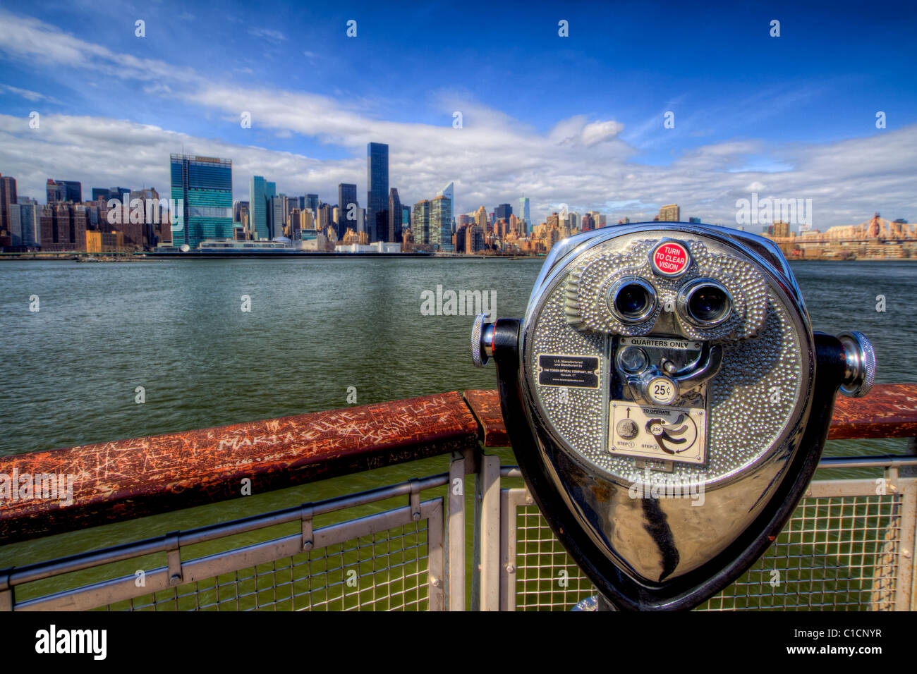 Commercial binoculars focused on 59th Street Bridge from Gantry State Park in Long Island City, Queens Stock Photo