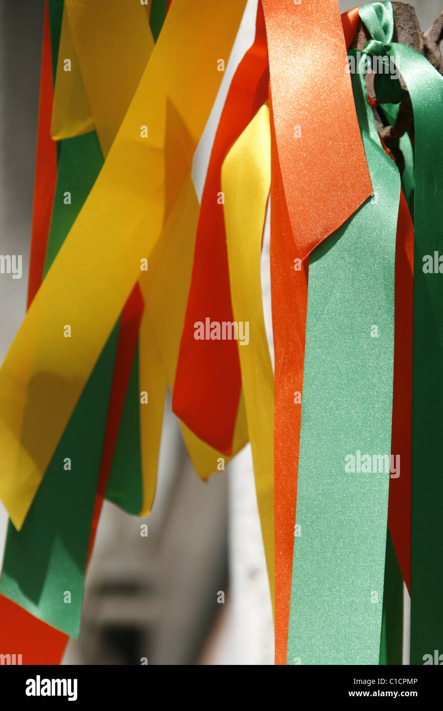 colourful carnival ribbons on wall in city town Stock Photo - Alamy