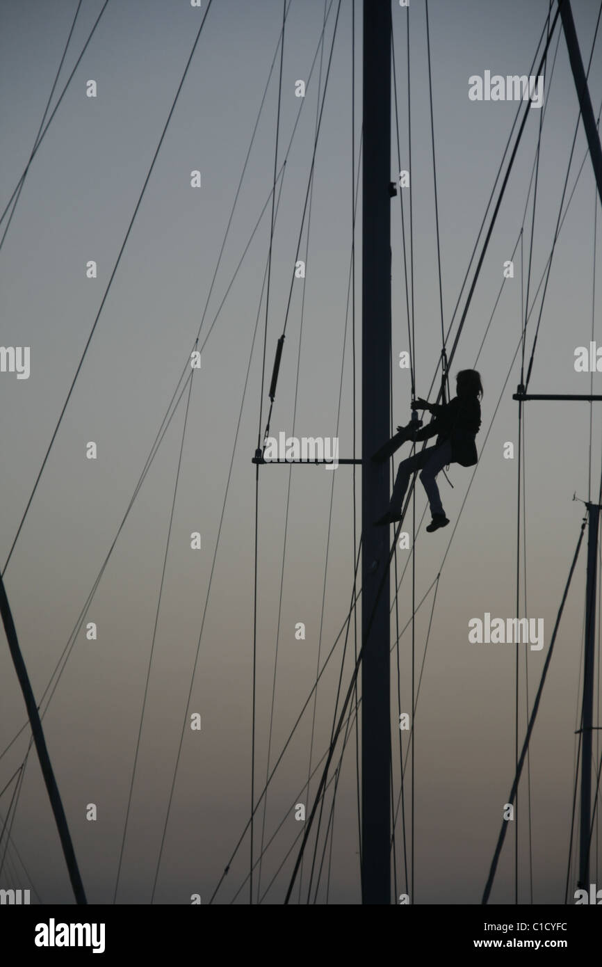 person repairing yacht boat rigging Stock Photo Alamy