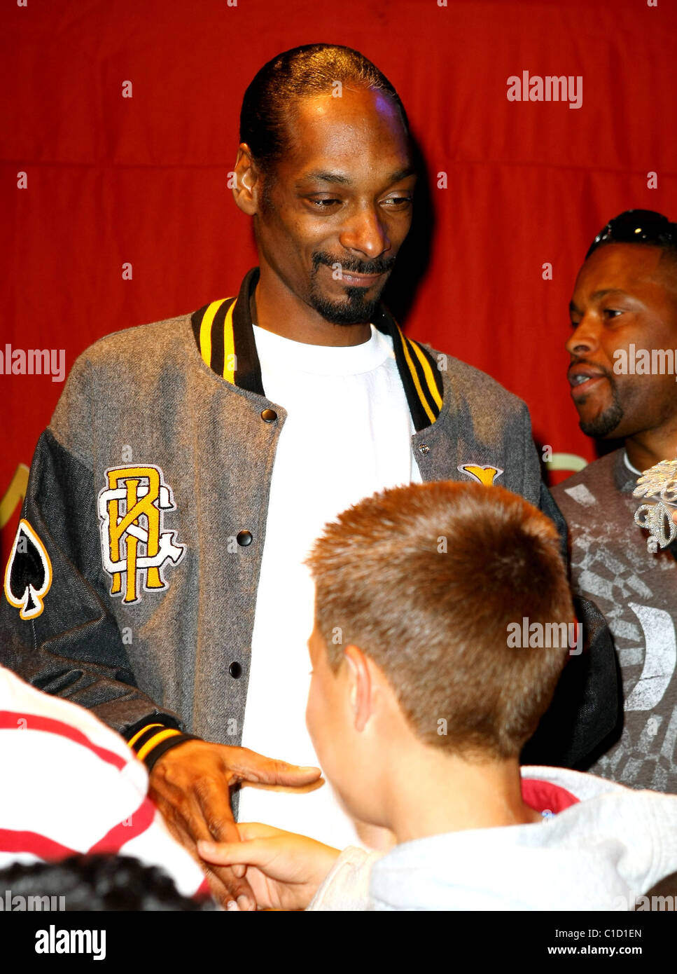 Snoop Dogg and Los Angeles Pomona Steelers Football Team Snoop Dogg unveils his wax figure at