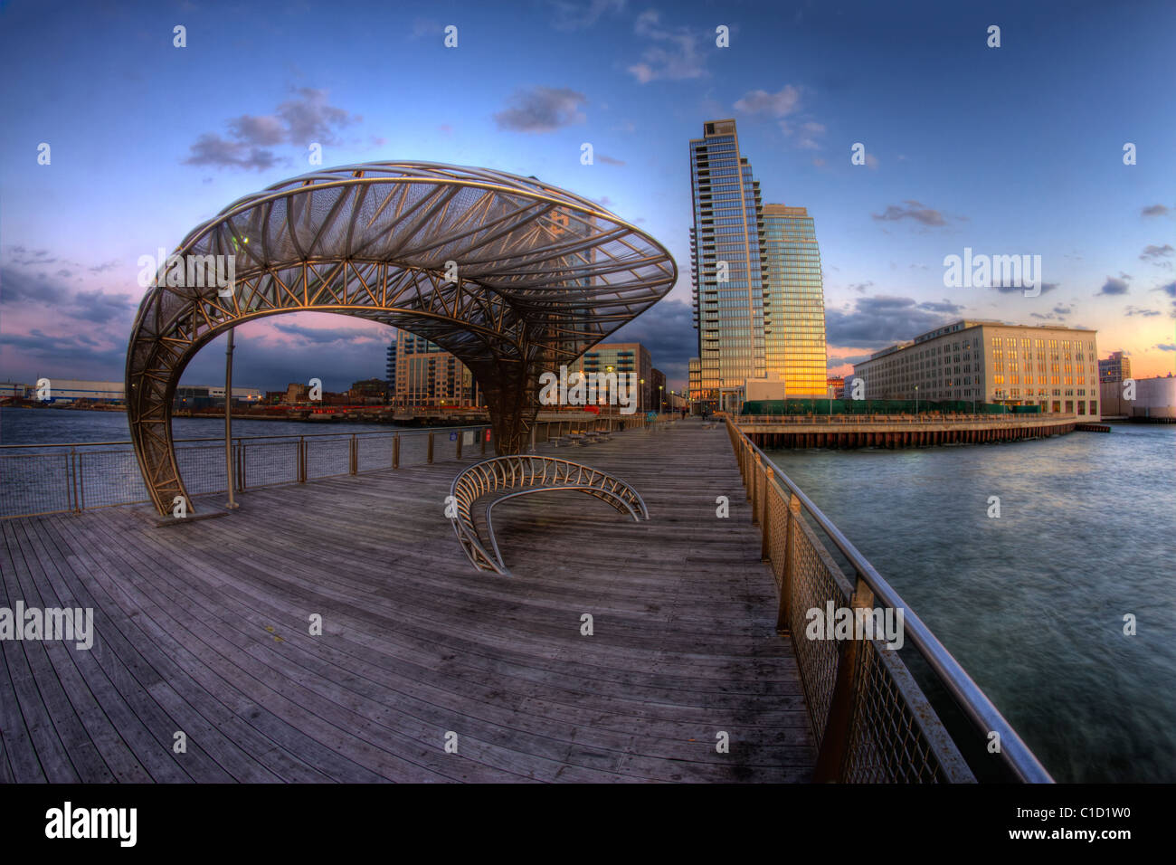 Fisheye view of the pier at Northside Piers development in Williamsburg, Brooklyn just after the sun has set Stock Photo