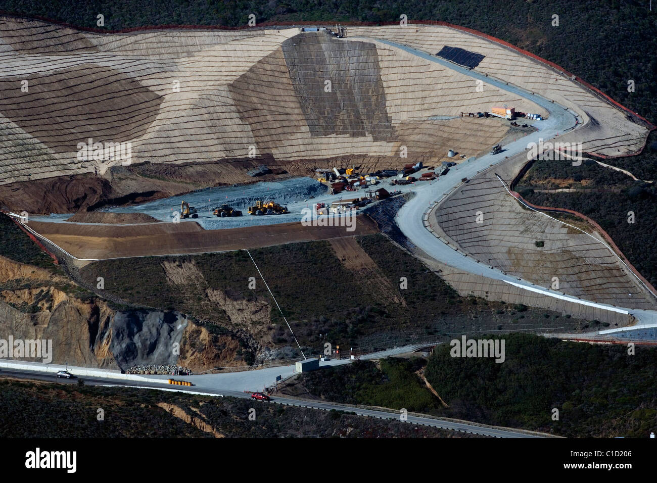 aerial view above disposal site for material excavated from Devil's Slide tunnel construction California Stock Photo