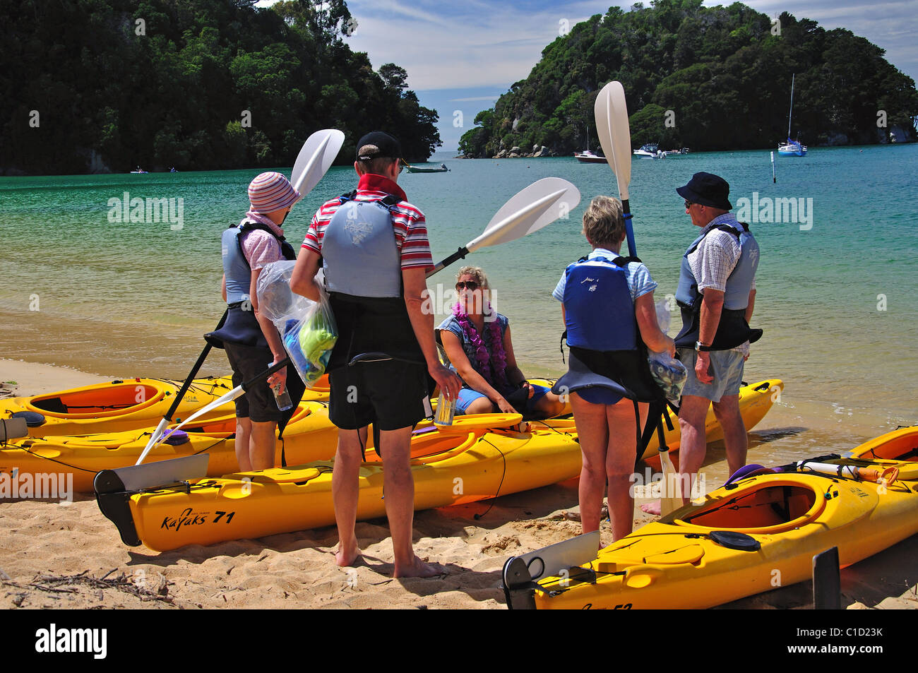 Kayaking group at Kaiteriteri Beach, Kaiteriteri, Tasman Bay, Nelson Region, South Island, New Zealand Stock Photo