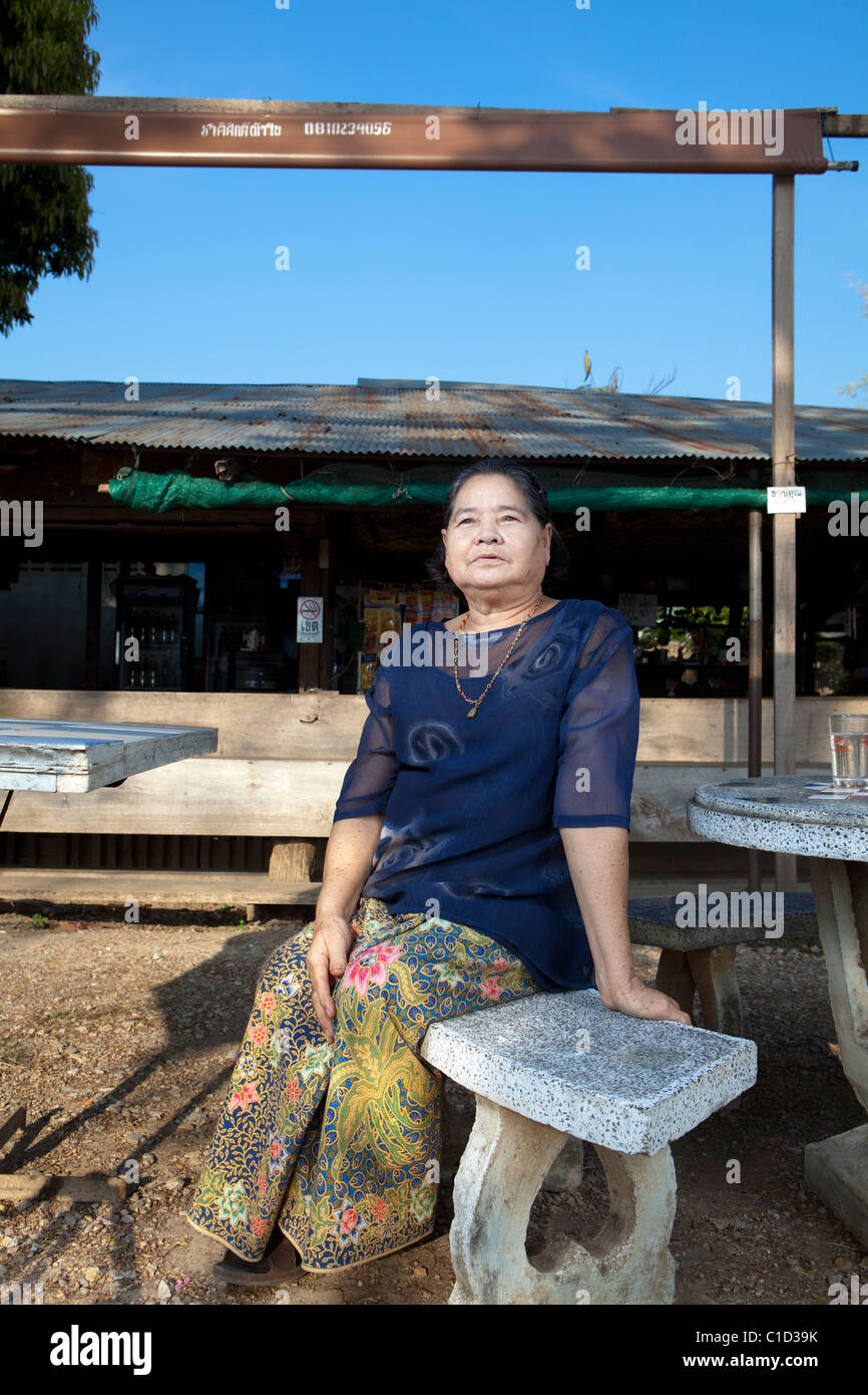 She run the small restaurant over 30 years in Lampang. Lampang, Thailand Stock Photo