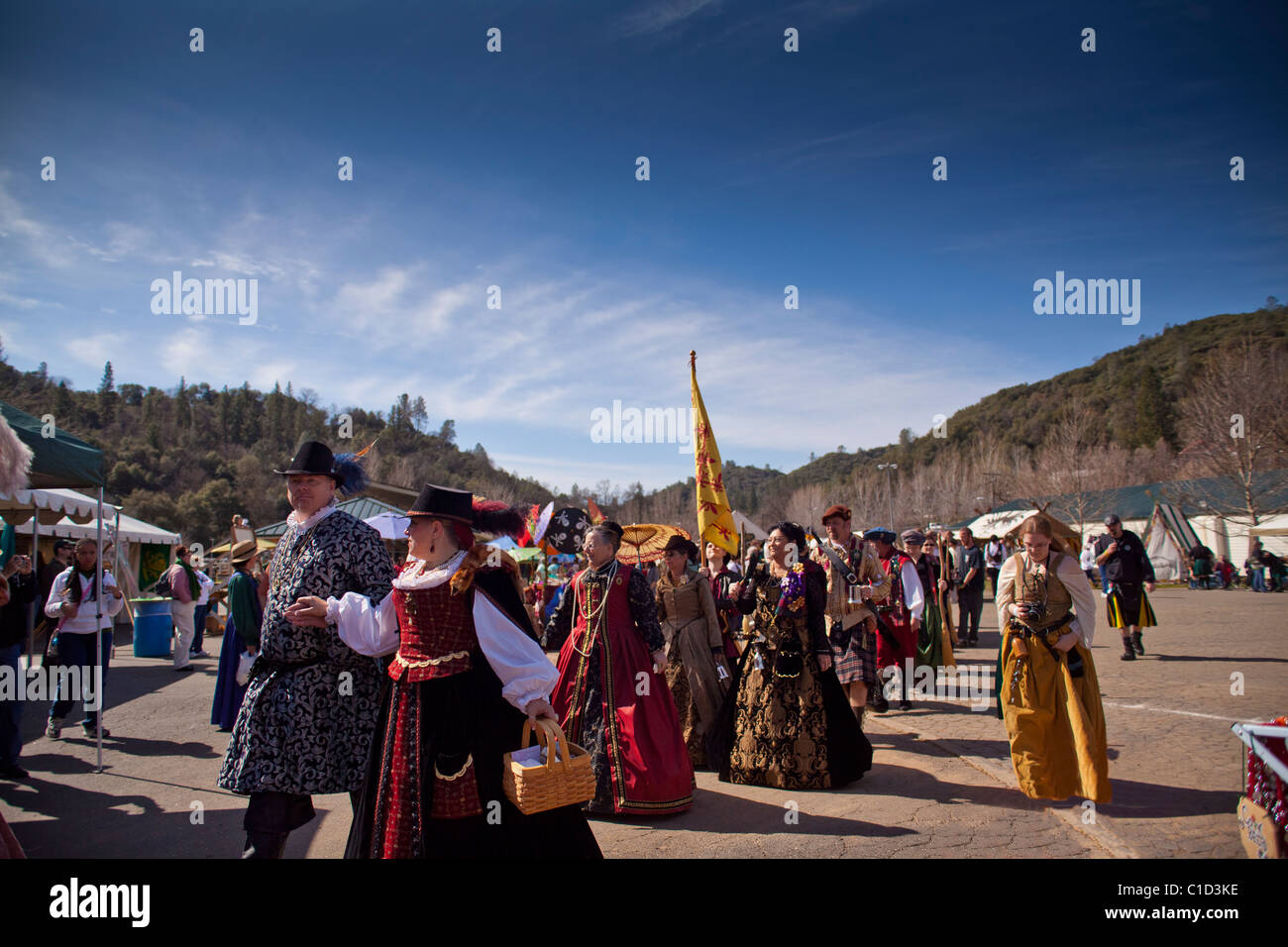 The procession of burly men escorting the queen at the Sonora