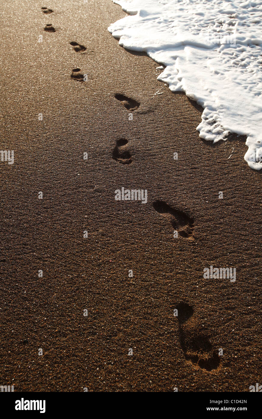 Footprints on the beach Costa Rica Stock Photo
